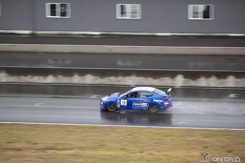 The Mazda 3 TC America Car on the Ridge Motorsports Raceway in rain