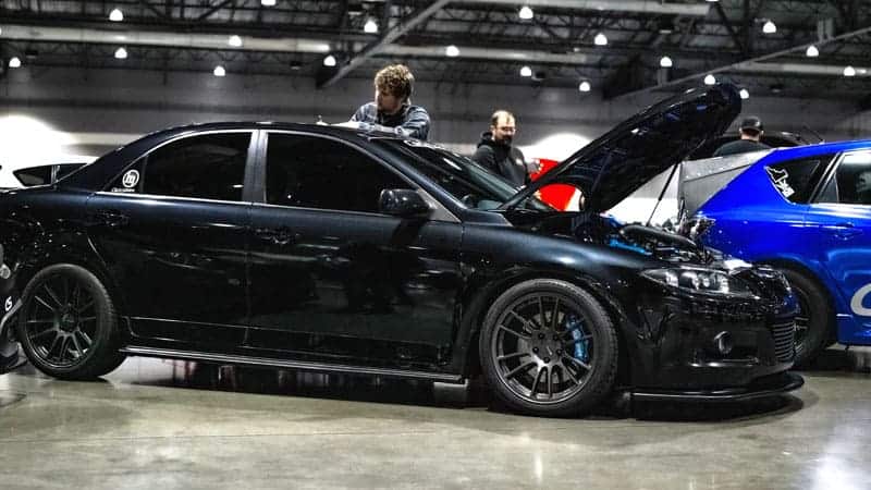 Mazdaspeed 6 at car show with lowering springs and brake kit