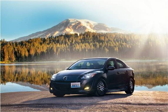 Mazda3 with mountain in background
