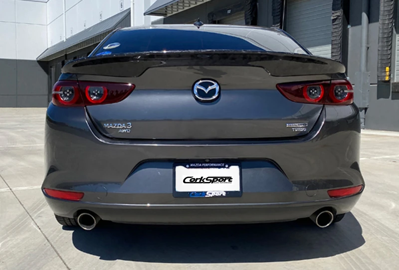https://corksport.com/images/4th-Gen_Mazda-3/2019-Mazda-3-Sedan-Lip-Spoiler/Mazda-3-4-door-trunk-spoiler-2-1.webp