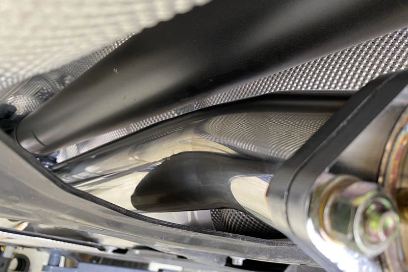 Close up of the 80mm Cat Back Exhaust fitment matching OEM quality