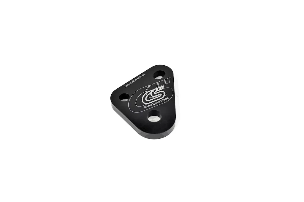 The OEM RMM mounting bracket is replaced with a 1/2" thick 6061-T6 plate to maintain all three OEM hardware points
