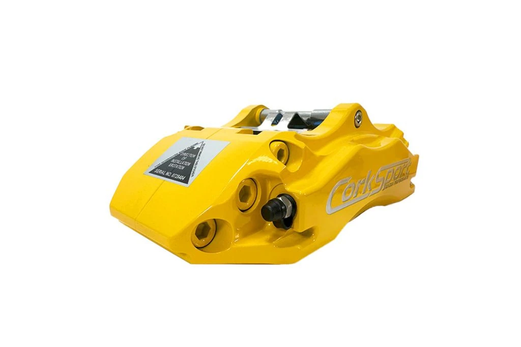 yellow mazda rear brake kit caliper with parking mechanism