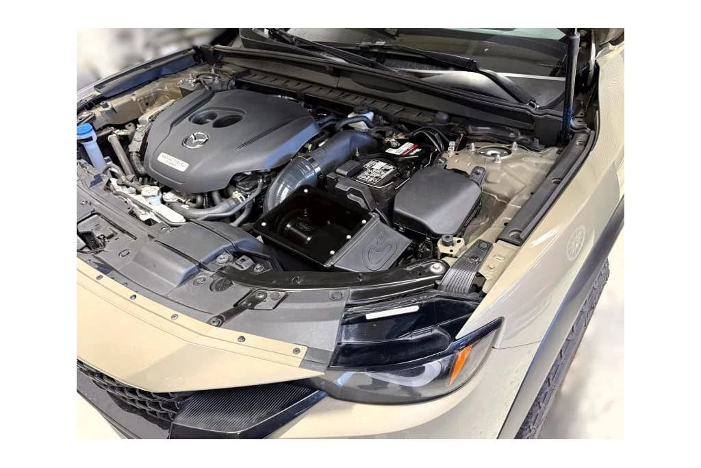 The CX50 Cold Air Box utilizes the factory fresh air duct to aid in lowering intake air temperature.