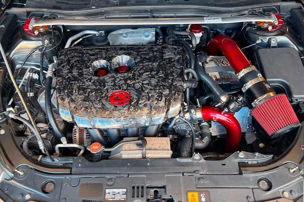 A clean and simple engine bay with the turbo kit installed