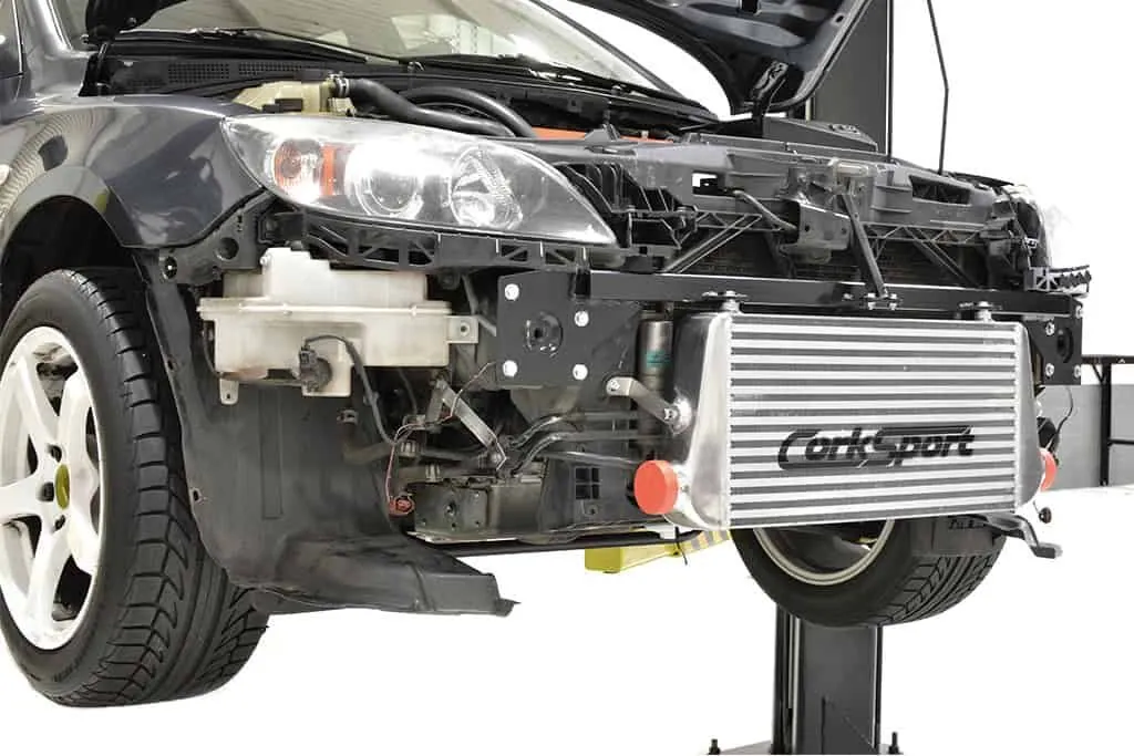 OE tow hook location and fog lights are retained with no modification.