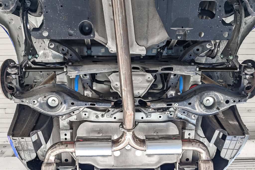 Rear toe arms Installed on the CorkSport TC America car.