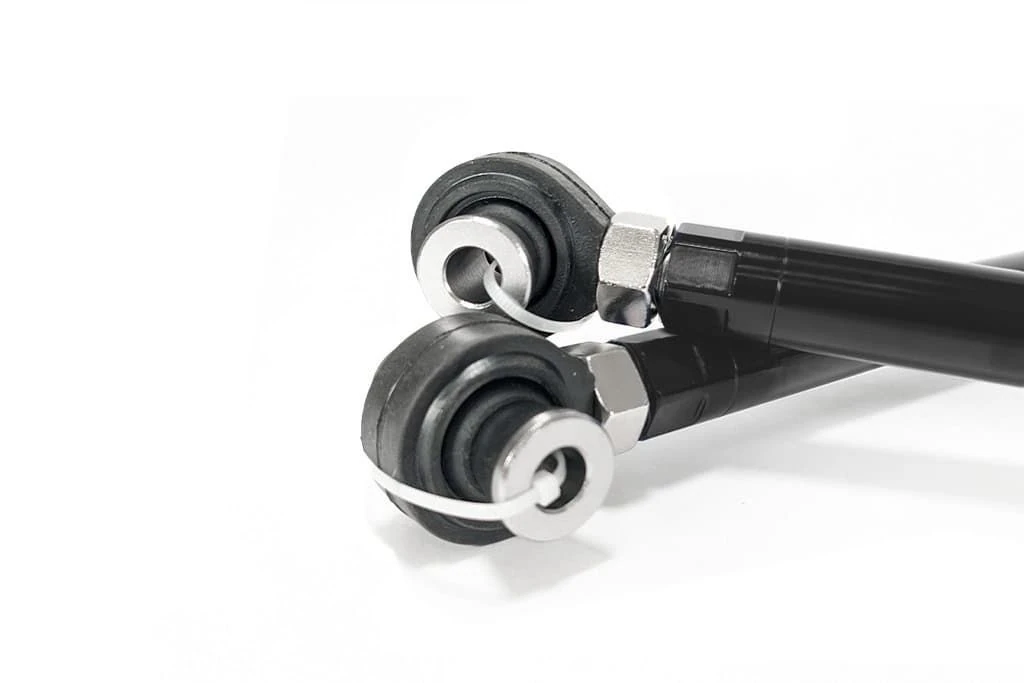 the rear toe arms for the Mazda 3 have spherical bearings to keep you in control of your alignment