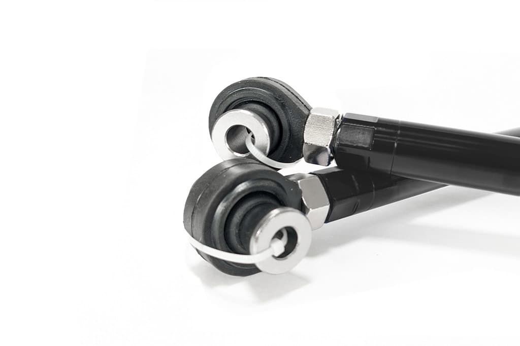 the rear toe arms for the Mazda 3 have spherical bearings to keep you in control of your alignment