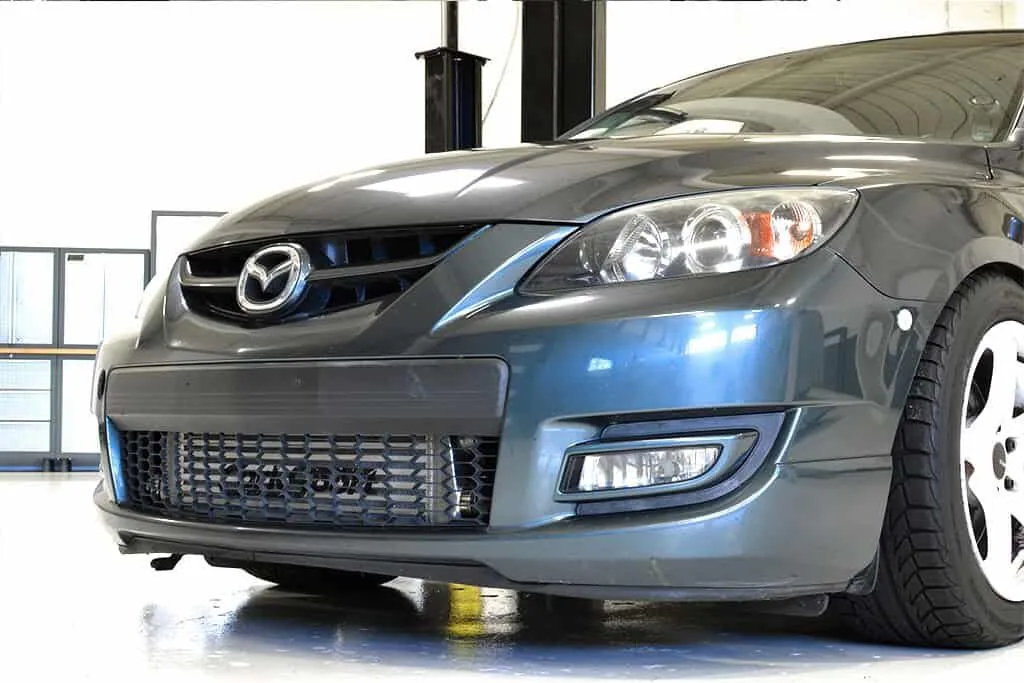 Little to no bumper trimming is needed to fit the big FMIC.