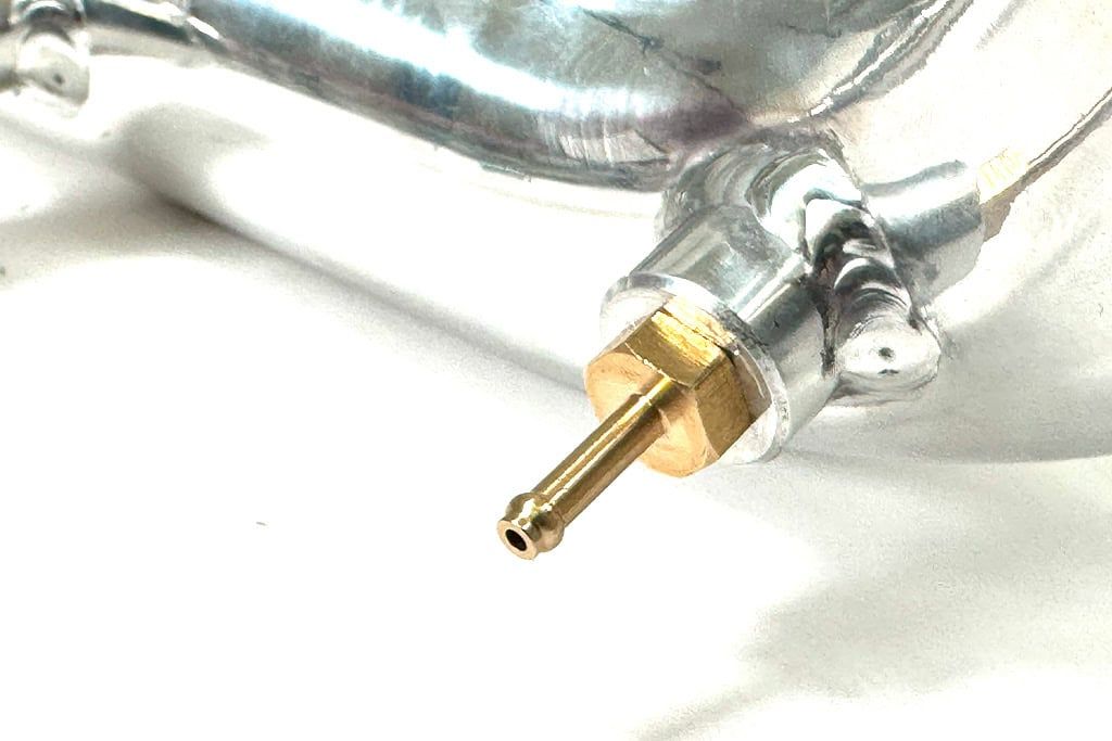 Boost reference adapter port on Mazdaspeed turbo inlet pipe