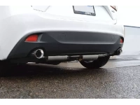 A rear-angled view of the cat-back exhaust from the driver's side.