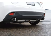 A rear-angled view of the cat-back exhaust from the driver's side.