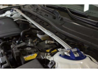 A view of the front strut bar installed from the driver's side.