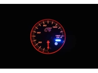 Orange face Mazdaspeed oil pressure gauge with warning.