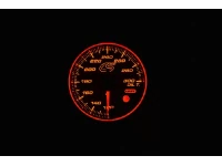 Orange face Mazdaspeed oil temperature gauge.