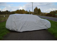 The cover includes a strap to secure the cover and keep it from blowing away in weather conditions