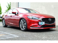 front postion on red Mazda 6 license plat relocation