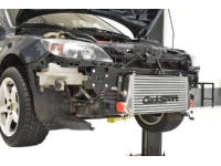 OE tow hook location and fog lights are retained with no modification.