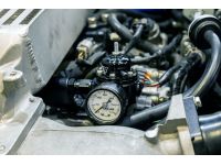 Return style fuel system increases fuel pressure with boost pressure to maintain a consistent fuel supply.