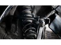 Spherical bushings replace the OEM rubber bushings for better handling feel.