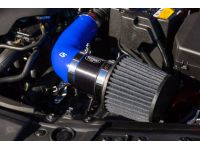 Blue short ram intake in engine bay.