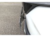 Side view of the Licenseplate relocation kit on a CX-50