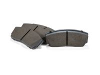 Set of 4 mazda performance brake pads which include the backer.