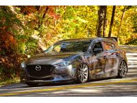 Front view of Mazda 3 Turbo with Gurney Flap style wing extension