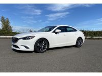 With the lower center of gravity the Mazda 6 will perform better in the corners.