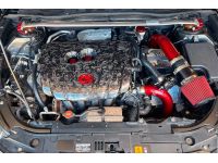 A clean and simple engine bay with the turbo kit installed