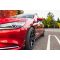 Stiffer rear springs reduce understeer and body roll at the limit